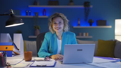home office worker woman says wow to camera.