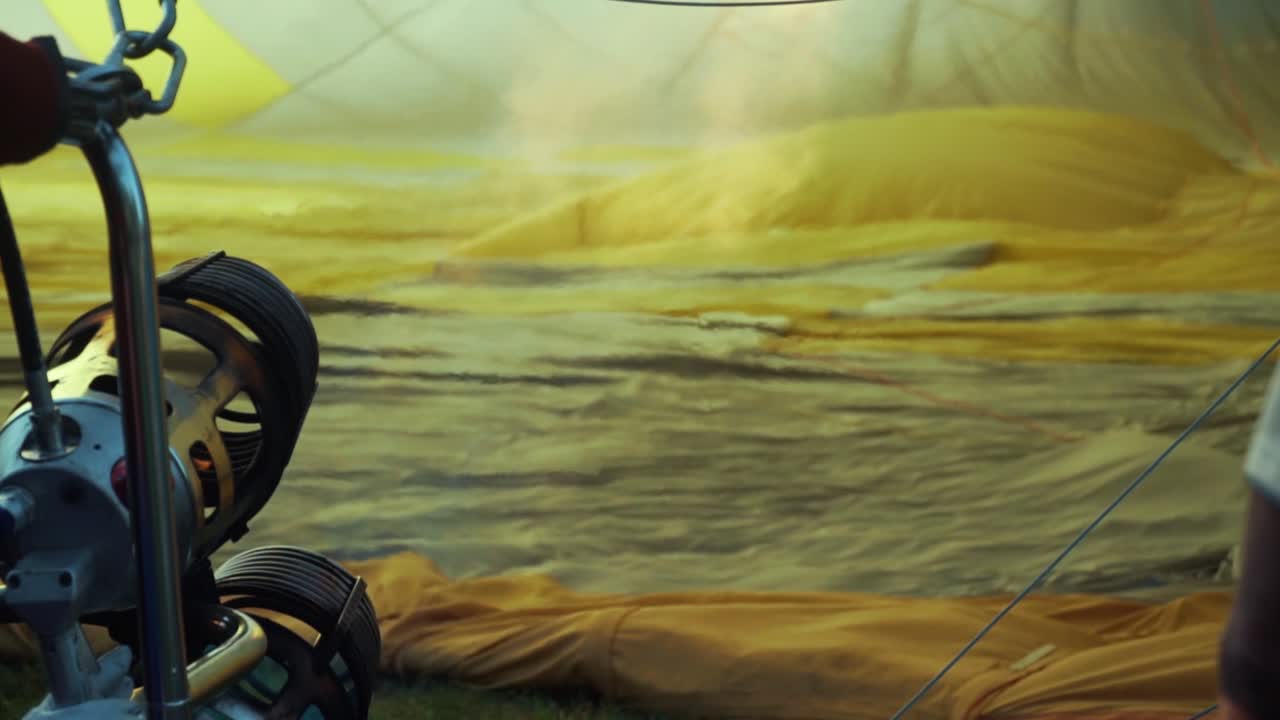 blowing hot air balloon with flame