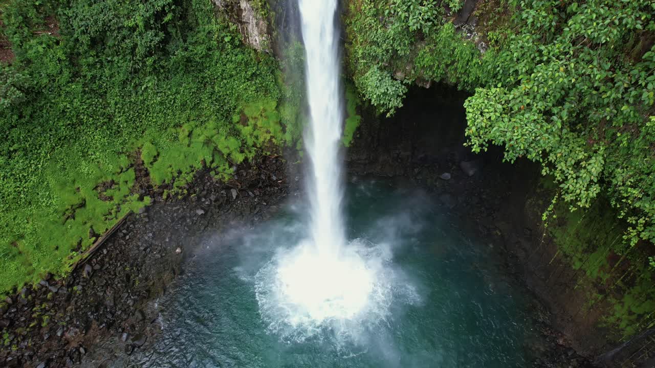 Premium stock video - Turquoise waterfall in costa rica