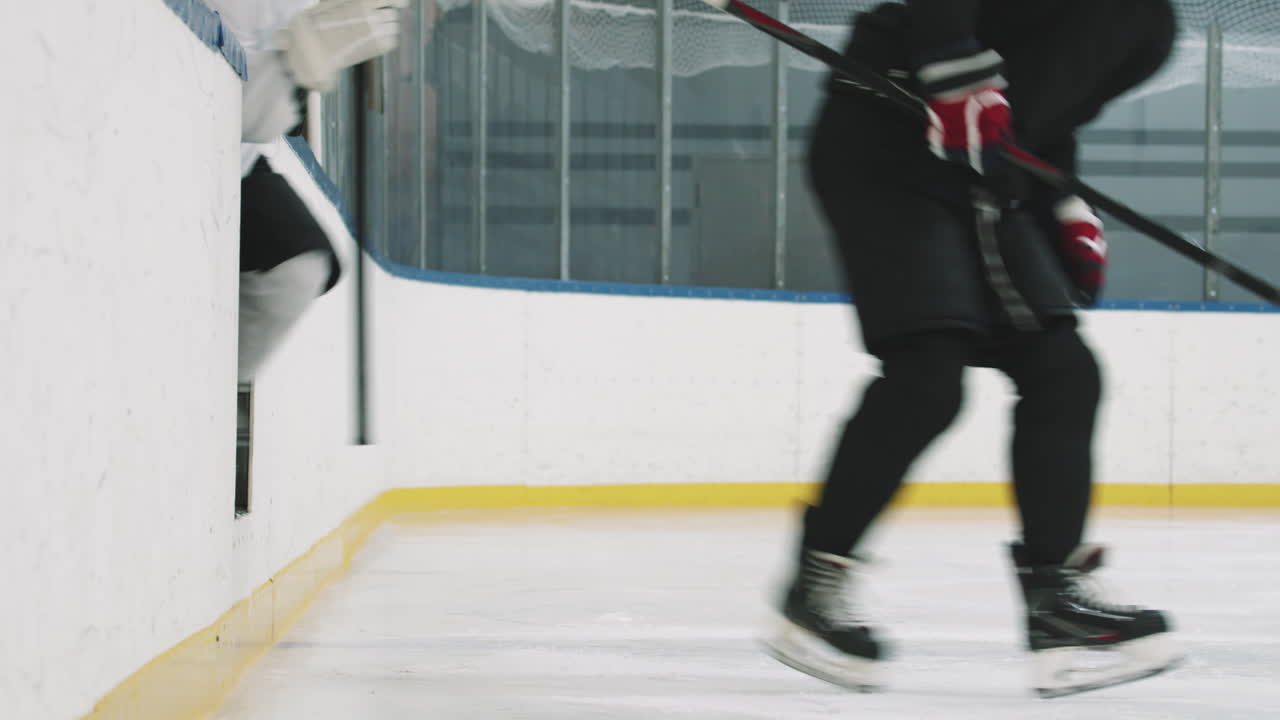 Hockey Players Going Out On Ice Rink