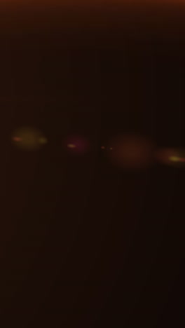 animation of orange glowing light on brown background