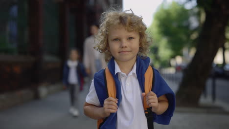 young boy going to school