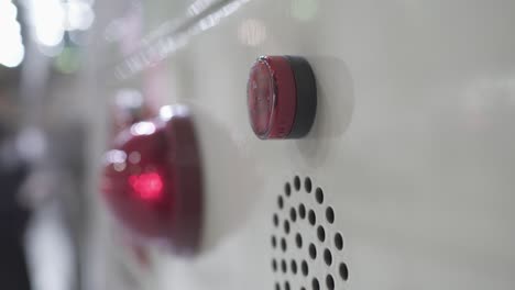 close-up on fire hydrant in modern building. the lens shakes slightly. fix shot. the color of the panel is light beige.