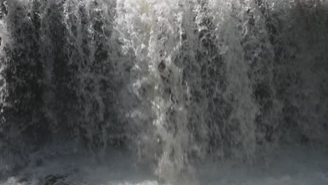 Cascading-waterfall-in-Owen-Sound,-Canada,-during-daytime,-creating-a-powerful-and-serene-scene