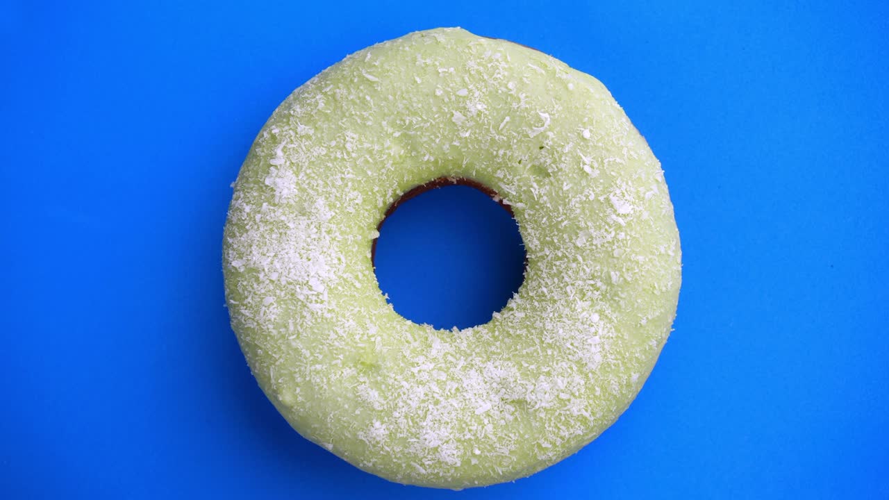 el donut está vidriado de cerca, con un bucle sin costuras.