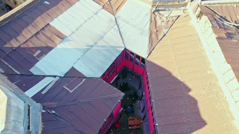 Aerial-view-looking-down-over-colourful-Concha-y-Toro-garden-gallery-restaurants-hidden-in-Santiago,-Chile-neighbourhood