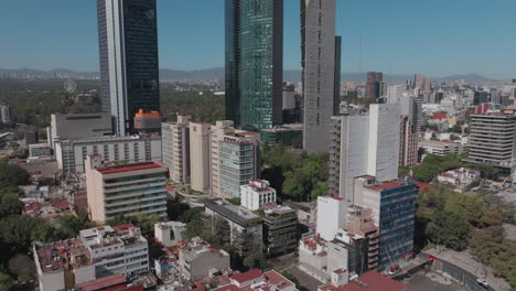 Aerial-drone-footage-showcasing-the-bustling-streets-and-impressive-architecture-of-Mexico-City-during-daytime