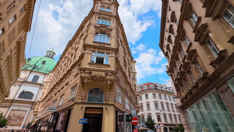 vienna, austria - june 9, 2025: exploring the charming streets of wien. tourists admire the beautiful architecture and vibrant atmosphere in the streets of wien, austria, on a sunny day