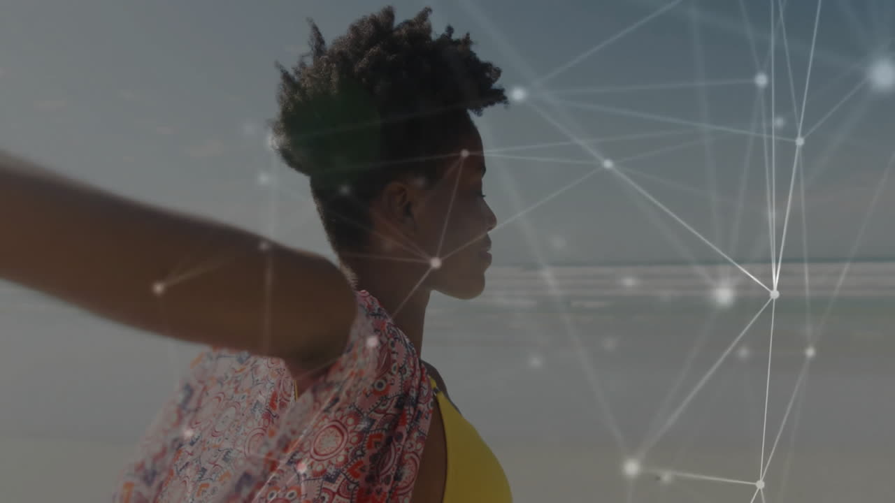 Person on beach with network connections and data processing animation overlay
