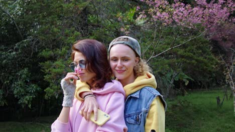 two women enjoying a spring day in a park