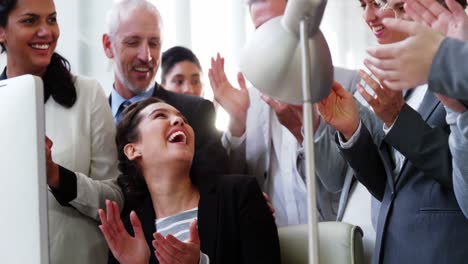 group of business people appreciating their colleagues works