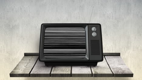 televisión en la parte superior de una mesa de madera
