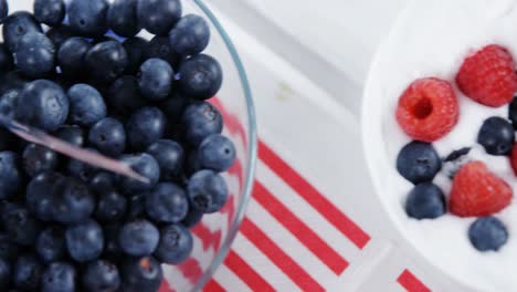 fruit ice cream and blueberry on wooden table