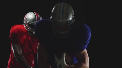 two american football players in action