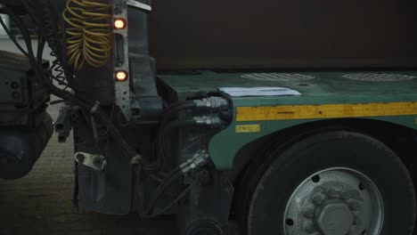 close up of a truck slowly driving by