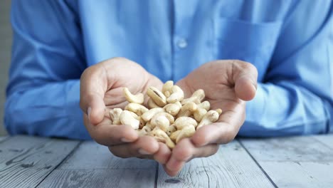 cashews in hands