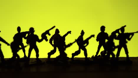 silhouette of soldiers with rifle