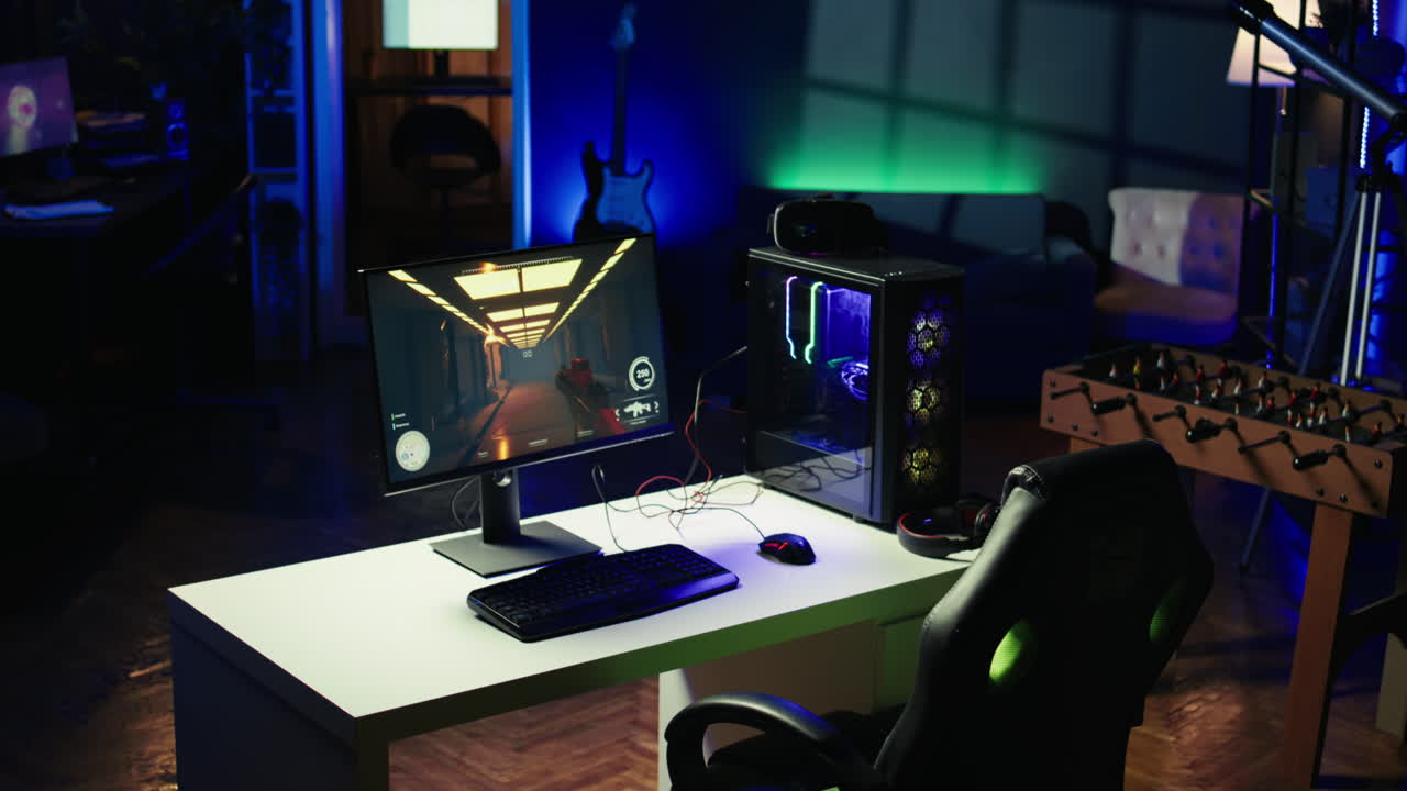 Close up shot of PC, keyboard and mouse on desk in living room