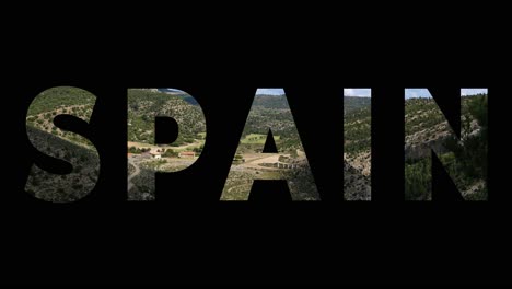 Landscape-Of-Countryside-Overlaid-With-Graphic-Spelling-Out-Spain