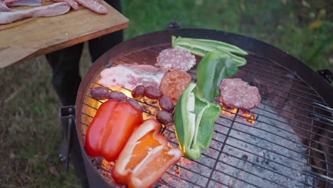 delicious barbecue with grilled meat and vegetables
