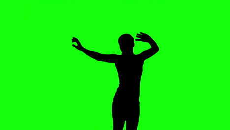 silhouette of woman jumping and raising arms on green screen