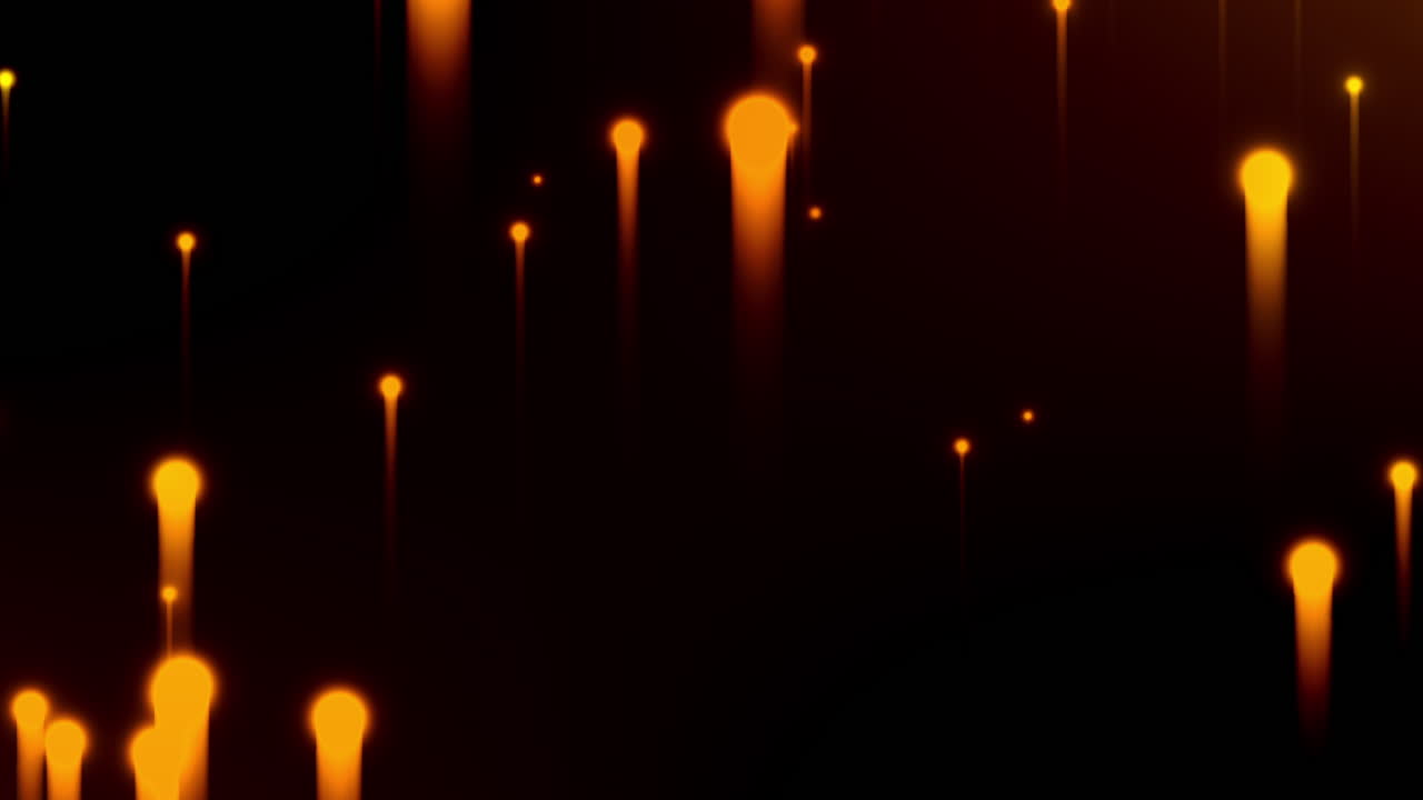 gran explosión de partículas naranjas con rastros que se desvanecen al final