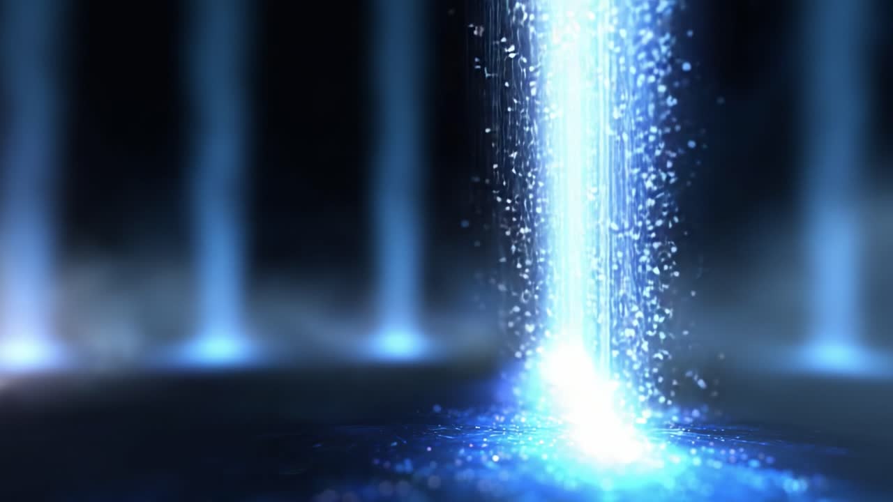 A mesmerizing display of cascading blue light particles resembling a mystical waterfall, emanating a sense of tranquility and wonder in a darkened environment