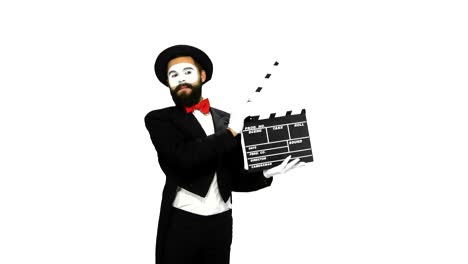 mime holding clapperboard