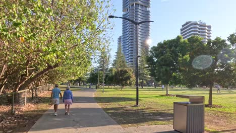 people enjoying a sunny day in a green park