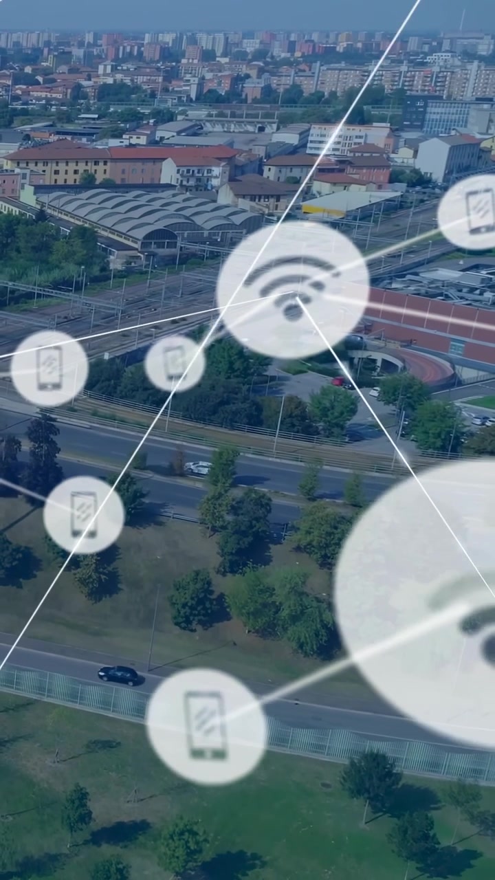 Video verticale: Un nodo che appare a sinistra avviando una rete, collegando icone di telefoni Wi-Fi, mappando la portata tecnologica.