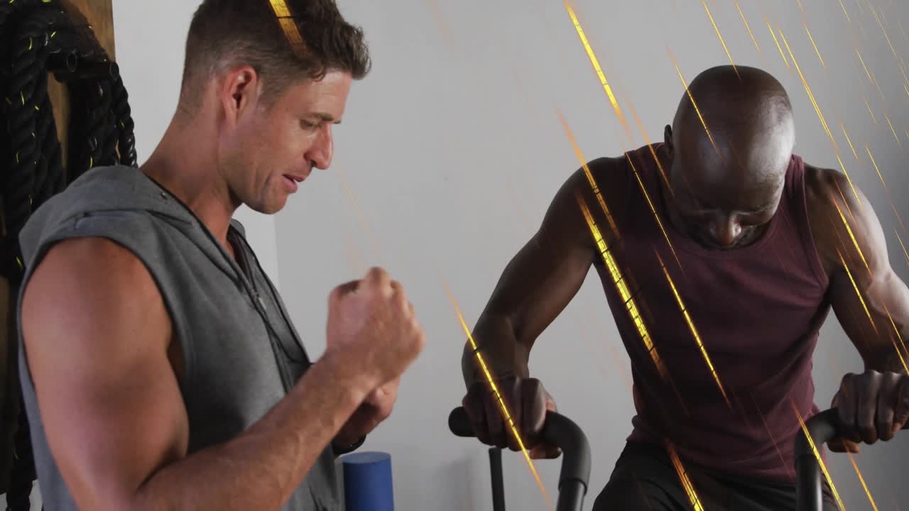 Trainer starting stopwatch in studio showing interval timer and rep graphic guiding fitness trainee