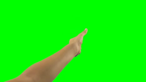 Person-making-hand-gesture-against-green-screen-background