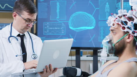 médico usando su portátil en una instalación moderna para la investigación del cerebro