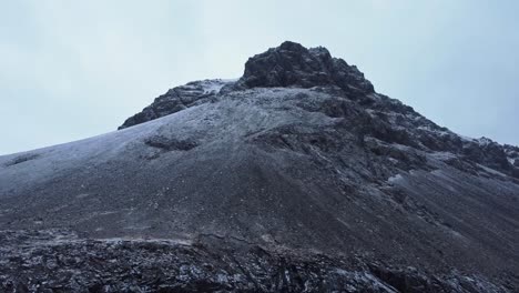 rough mountain slope on winter day