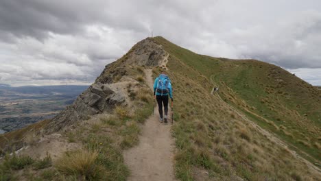 Girl-Hiking-Alone-on-Roys-Peak