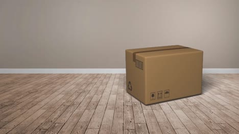 Animation-of-cardboard-box-falling-on-wooden-floor