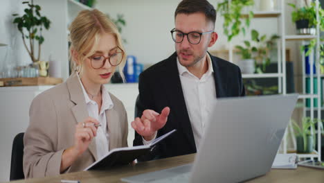 business colleagues discussing in office