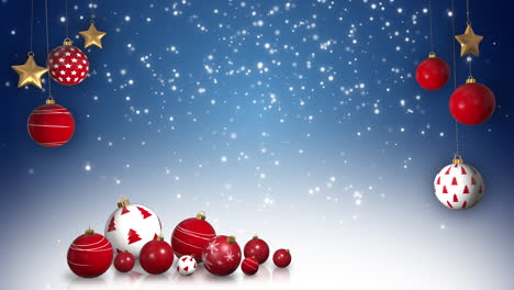 christmas blue background with falling snow and red balls on strings. copy space. festive new year's loop animation.