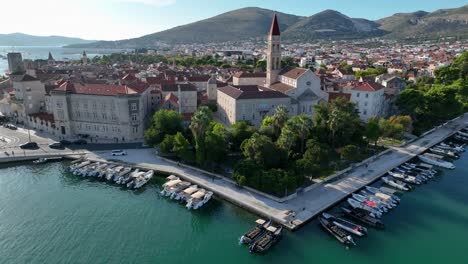 old town of trogir with picturesque harbor, boats, and traditional architecture
