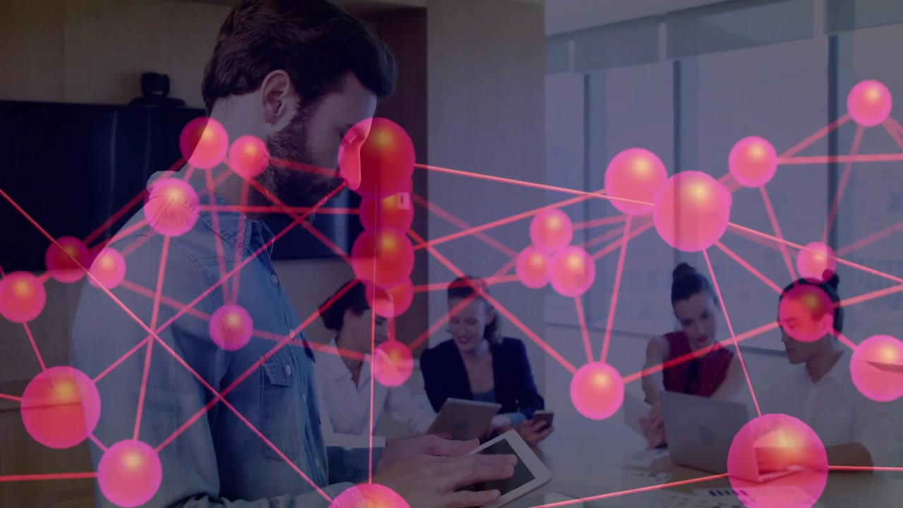 Bearded man tapping tablet starting pink net overlay linking devices, team working on business data