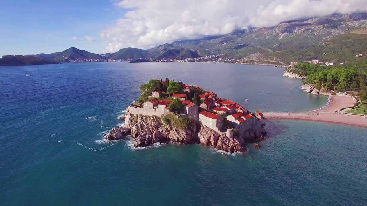 Remarkable aerial shot over the beautiful Sveti Stefan island in Montenegro 4