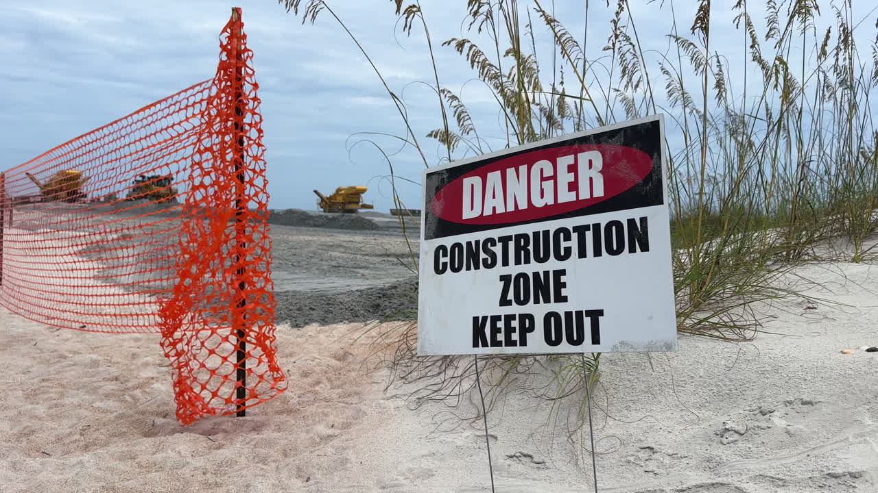 Danger construction zone keep out sign, beach replenishment project