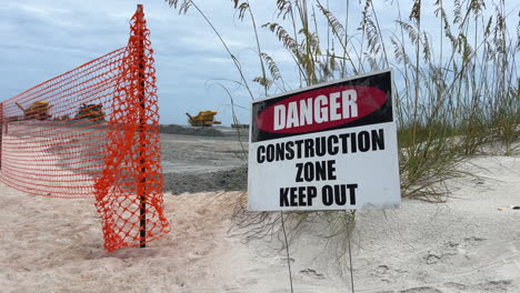 danger construction zone keep out sign, beach replenishment project