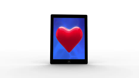 numeric tablet with red heart in blue background