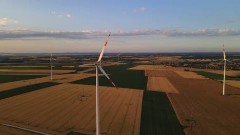 Flying-next-to-a-wind-turbine,-drone-footage