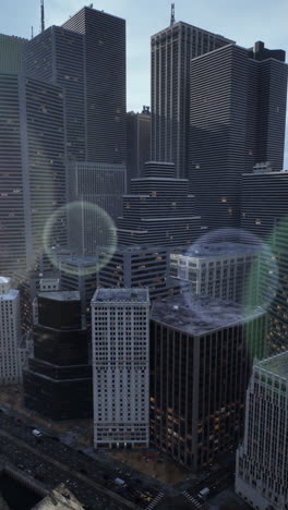 aerial view of a city at night with skyscrapers