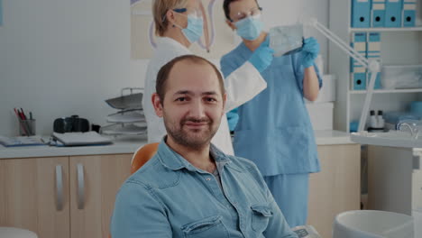 portrait of oral care patient smiling and looking at camera