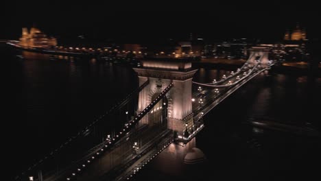 Amazing-Hyperlapse-Above-Szechenyi-Chain-Bridge-at-Night-in-Budapest,-Hungary