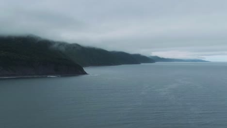 Lush-Mountains-Of-Saint-Anne-des-Monts-From-The-Saint-Lawrence-River-At-Early-Morning-In-Quebec,-Canada