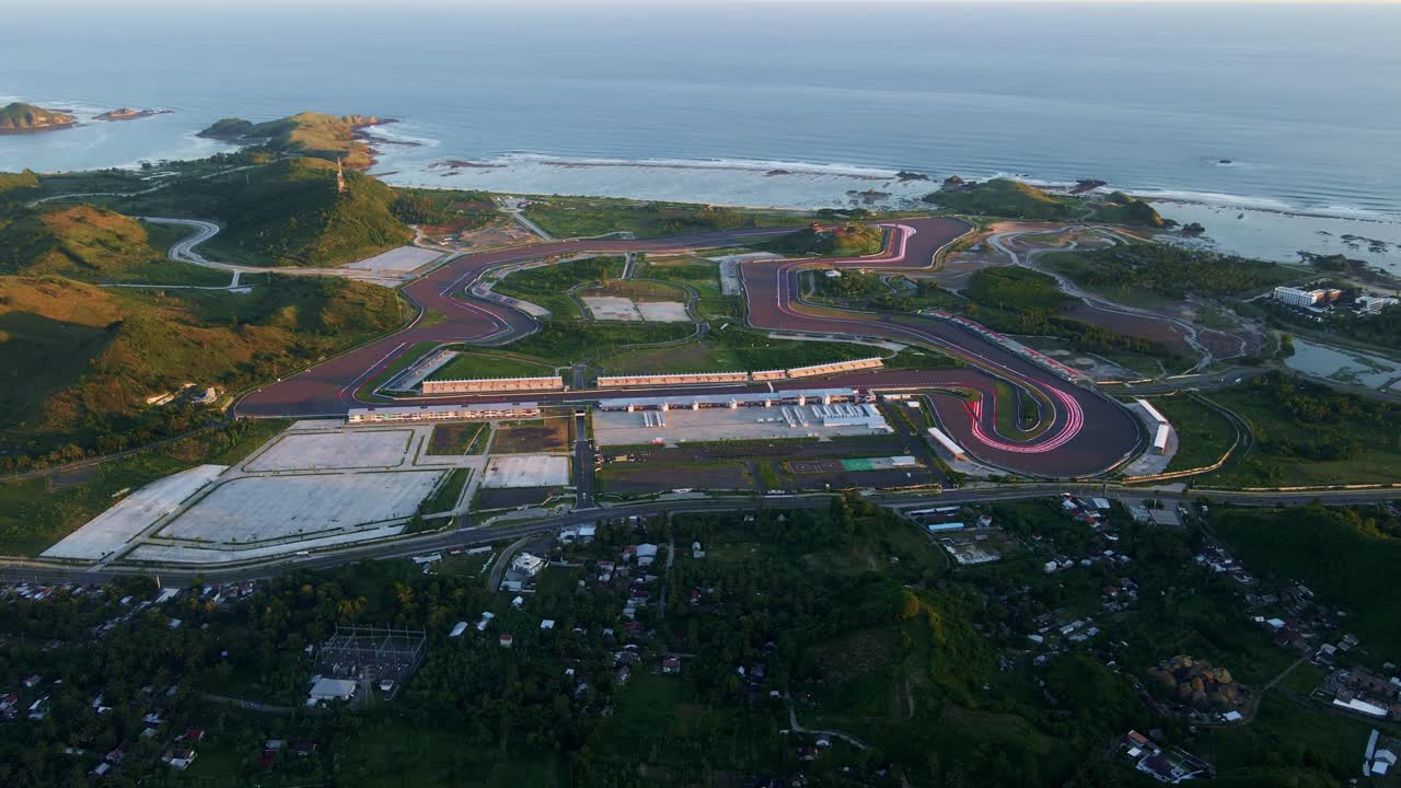 Mandalika Circuit in Lombok, Indonesia, offers a stunning blend of high-speed thrills and breathtaking coastal views. It's a premier venue for motorsports, set against a backdrop of natural beauty.